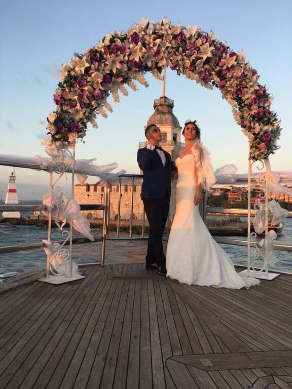 A couple at a private event on a boat
